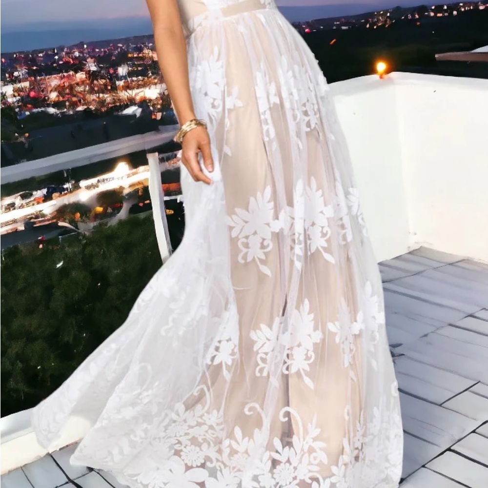 Beautiful white long dress. Perfect for rehearsal dinner or bridal shower!